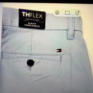 Tommy Hilfiger Men’s TH Flex Stretch Slim Fit Chino Pants. 
Light Blue